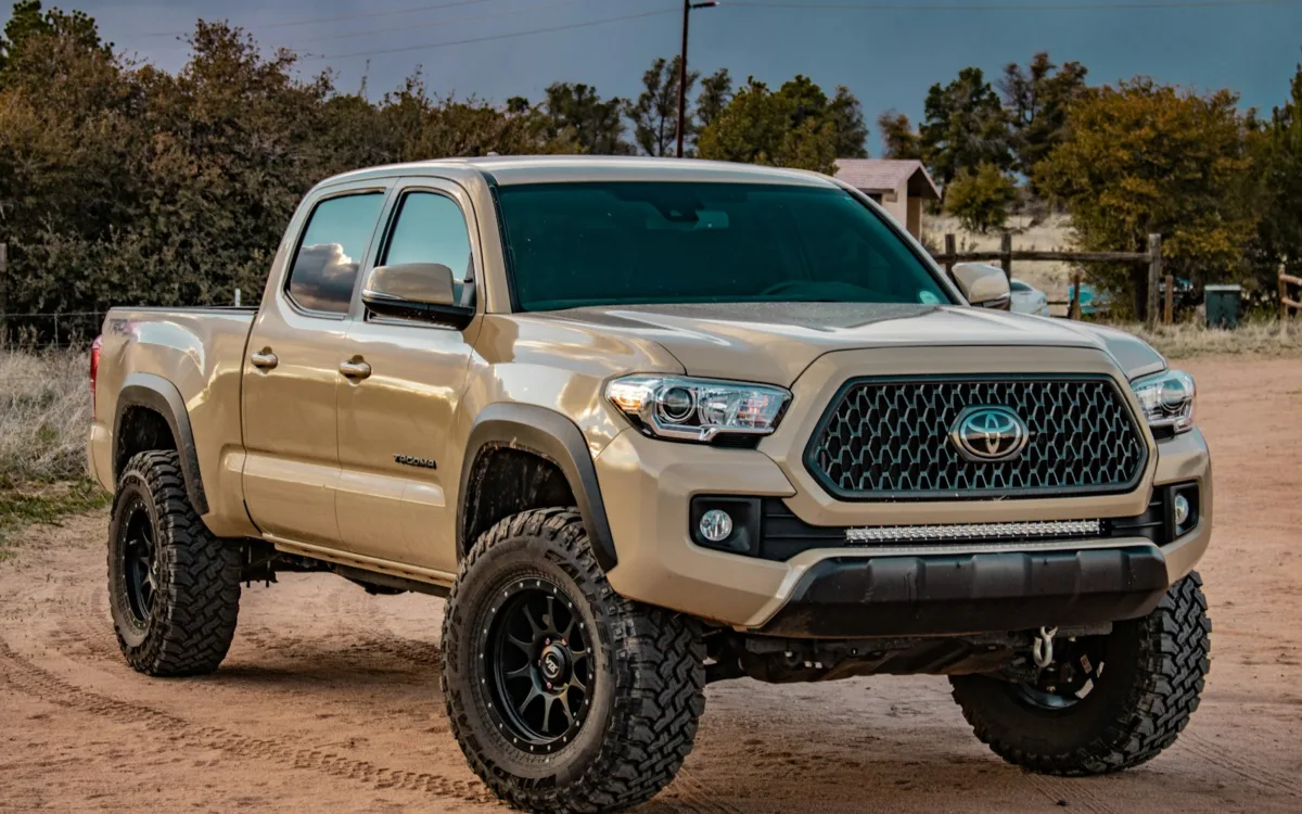 Tan Toyota Tacoma pickup truck for a guide to the best speakers for toyota tacoma