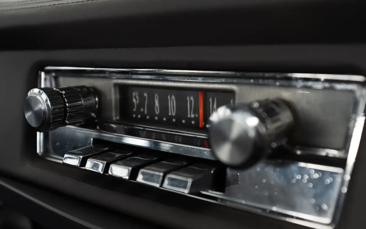 Car radio knobs used to find the best bass and treble settings for speakers in car audio