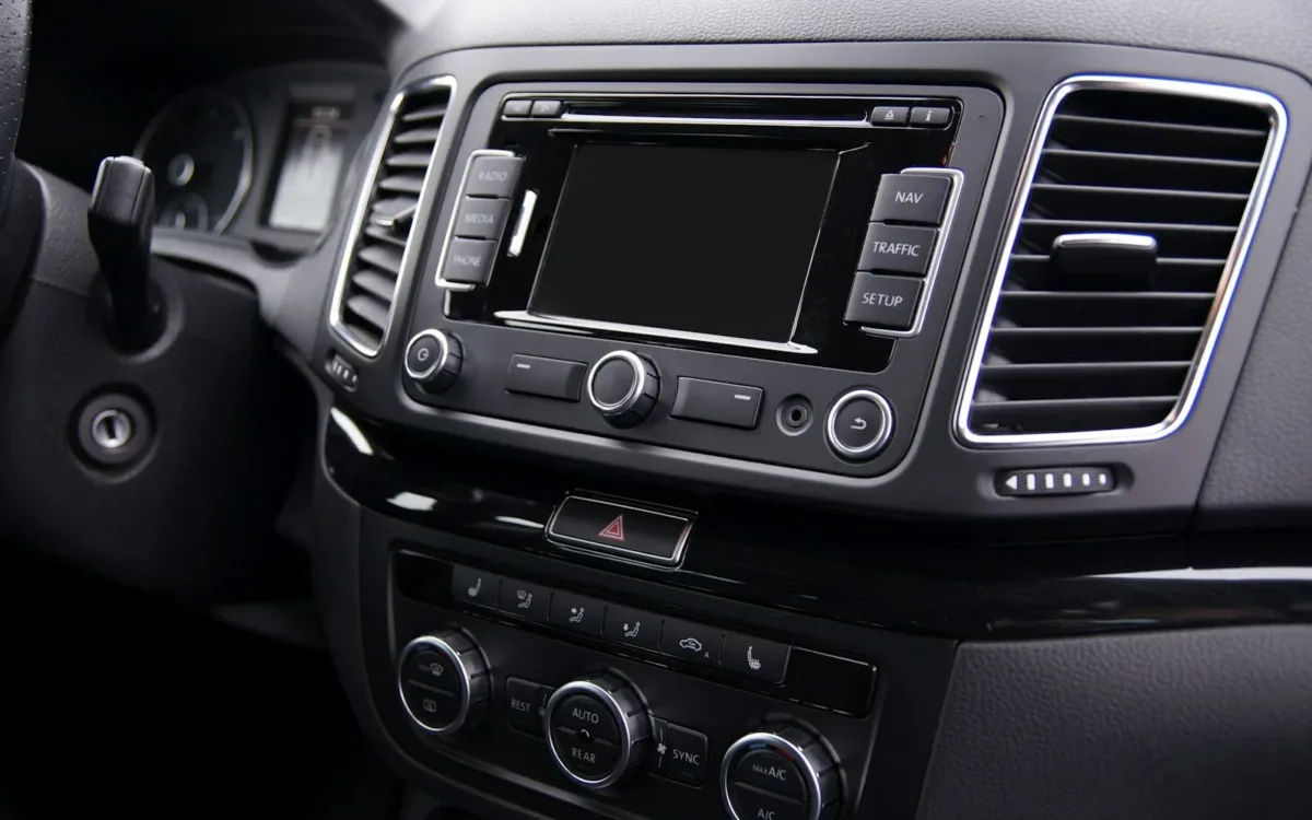 Factory car head unit in a dashboard showing how to use dsp in car audio