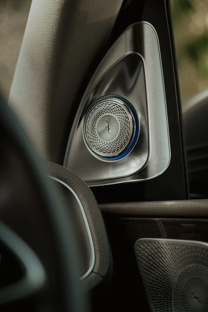 Tweeter grille mounted on the front pillar trim of a car