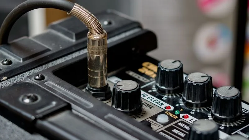 A digital sound processor unit with channel controls used to tune a car audio system