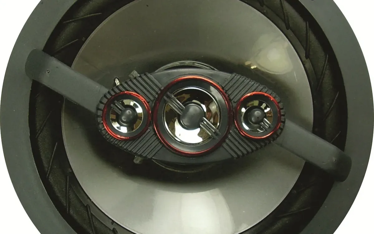 How do you measure car speakers: a coaxial car speaker showing its frame, cone and mounting holes