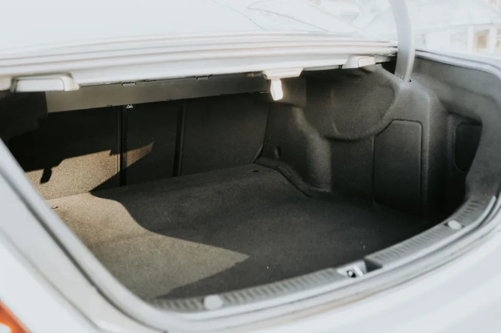 Empty sedan trunk showing the usable cargo floor