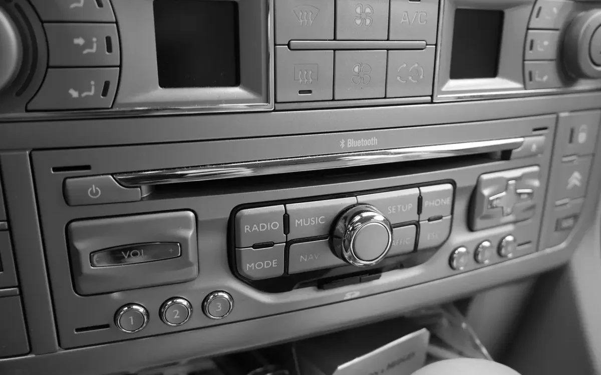 Factory car radio with preset buttons used when you learn how to reset car radio settings and codes