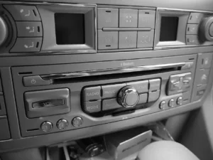 Factory car radio with preset buttons used when you learn how to reset car radio settings and codes