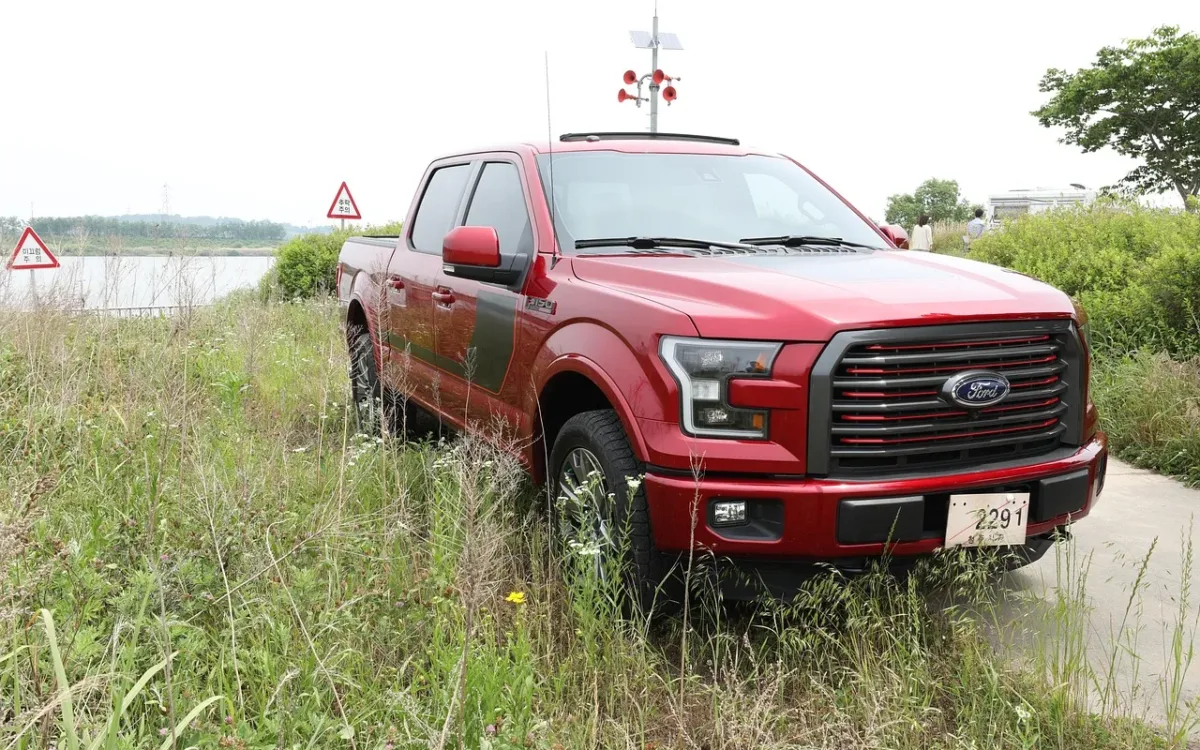 Red Ford F-150 crew cab pickup truck, the truck covered in this guide to the best speakers for ford f150