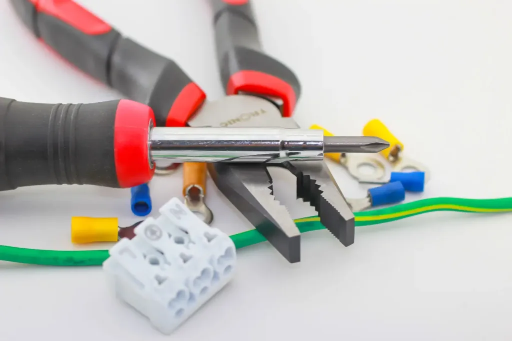 Screwdriver and pliers with wire connectors and electrical accessories