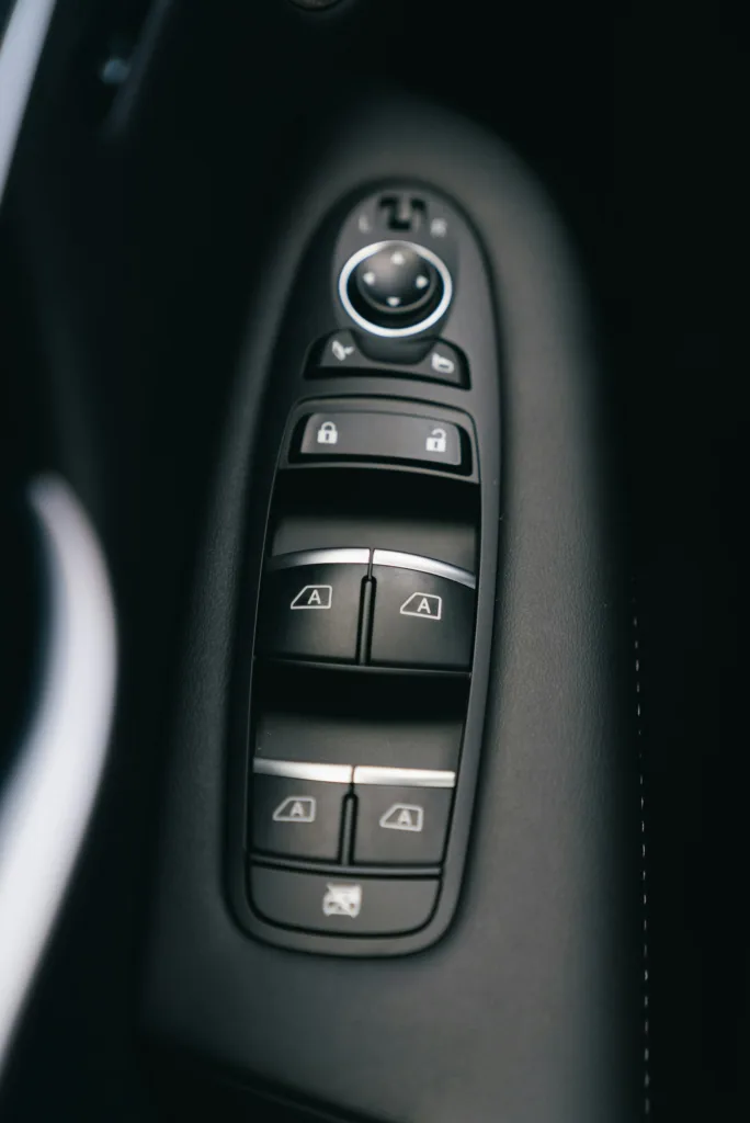 Window and lock switch panel on a car door armrest
